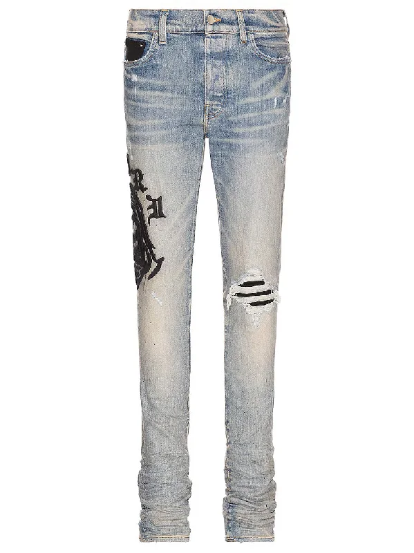 Amiri Wes Lang Reaper Logo Clay Indigo Jeans in Blue